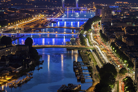 鲁昂州塞纳河上的桥梁日落地标黑暗天线天空景观建筑学城市全景蓝色图片