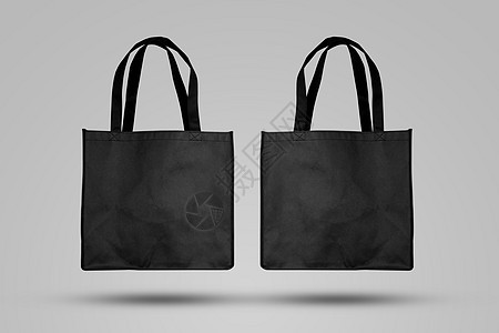 用于购物的模拟黑色手提袋织物模拟帆布袋纺织品与可重复使用背景图片