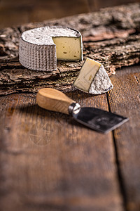 奶油乳酪美食桌子圆形产品小吃奶油状白色食物木头熟食图片