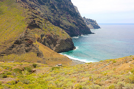 西班牙特内里费岛野生海滩和峡谷的空中景象蓝色山沟海岸假期石头海洋公园荒野天堂岩石图片