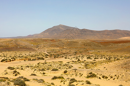 加那利群岛海滩附近的兰萨罗特沙漠海浪天空土地地平线旅行旅游爬坡沙漠橙子沙丘图片