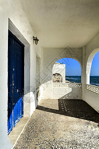 岸上白色房屋的建筑图示细节几何旅行海岸线蓝色房子海洋阴影季节支撑海岸图片