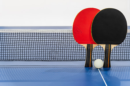 黑红桌网球网和网蓝色球拍锦标赛闲暇阴影乐趣运动游戏乒乓球冠军图片