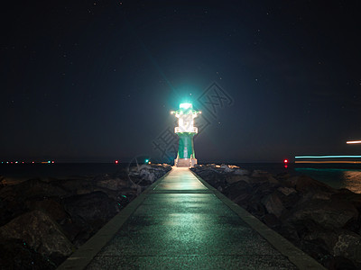 港口入口处的明光断水塔地平线海标导航海洋堡垒码头地标建筑学海港海岸图片