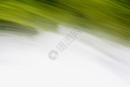 草水快速运动的抽象背景绿色速度线条黄色背景图片