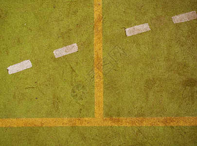 带线条的绿色格子呢赛道 纹理上的实线和虚线体育场操场运动数字比赛竞争橡皮运动员车道地面图片