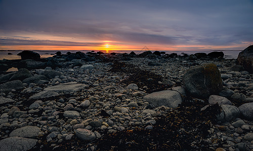 奈尔兰德斯特兰达太阳海岸天空岩石地平线自然海岸线放松海洋日落图片