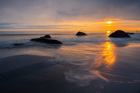 奈尔兰德斯特兰达自然岩石海岸线日落太阳天空放松海洋海岸地平线图片
