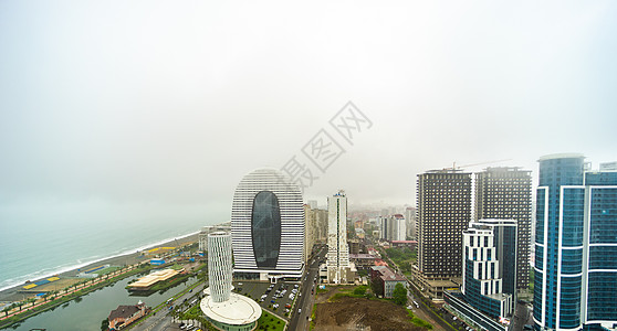 格鲁吉亚巴图米新大道薄雾摩天大楼海岸线海岸天空城市建筑建筑学市中心旅行背景图片