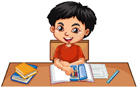 一个快乐的男孩在 des 上做作业孩子孩子们少年娱乐闲暇字体写作情感桌子青年图片