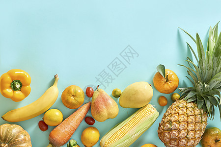 以浅蓝色背景收集新鲜黄水果和蔬菜 含淡蓝色背景橙子热带玉米食物黄色胡椒饮食南瓜图片