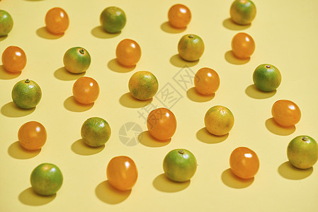 西红柿和或柑橘的无缝图案 抽象背景 黄色背景上的番茄蔬菜植物饮食营养农业图片