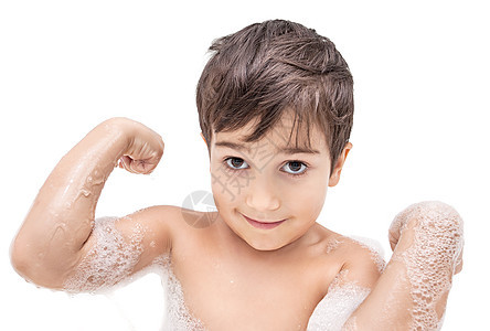 男孩在浴室洗衣服泡沫肥皂浴缸洗发水男性童年男生乐趣孩子享受图片