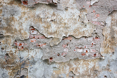 旧砖墙外有破碎的石膏图片