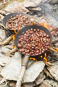 烤栗子棕色小吃食物季节水果板栗季节性火焰图片