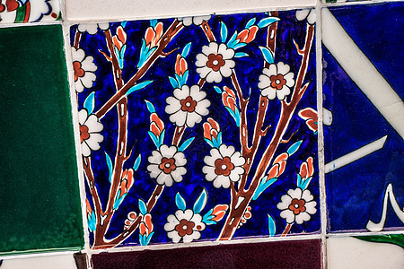 带有花卉图案的奥斯曼风格手工土耳其瓷砖建筑学绘画古董脚凳制品建筑历史火鸡马赛克蓝色图片