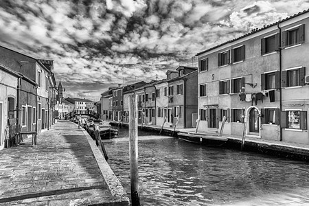 意大利威尼斯布拉诺岛运河一带的图画建筑 位于意大利威尼斯旅游城市景观天空房子街道旅行村庄房屋地标图片