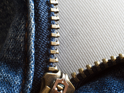 解zip 让金属压缩展示蓝色牙齿拉链秘密架子黄铜裤子图片