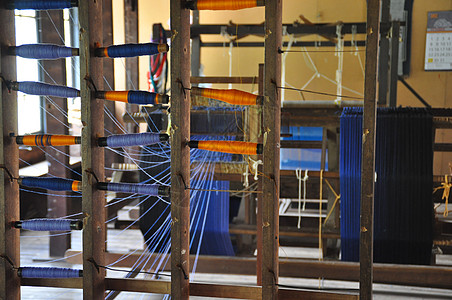 斯里兰卡一家工厂的编织机 一台纺织机手工制造业种植园商业测试地质学机械工业植物地热图片