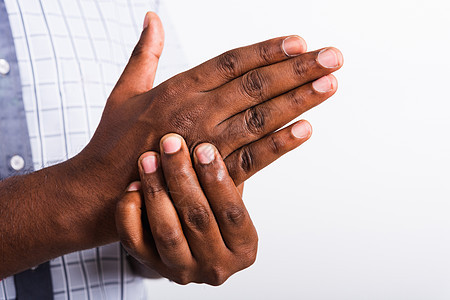 黑人握着手掌受伤 感觉疼痛手势拇指手腕痛苦风湿病肌肉治疗神经疾病办公室图片