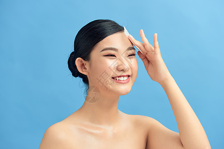 皮肤油脂性妇女脸上使用吸油薄膜情感组织皮肤科女孩美容印迹护理化妆品卫生女士图片