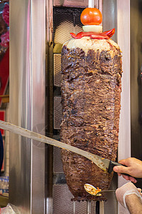 瓦切塔林土耳其传统Doner Kebab烤架美食烧烤炙烤捐赠者火鸡牛肉烹饪食物背景