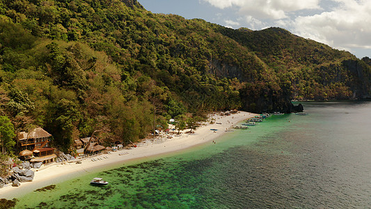 热带海水环礁湖和海滩 菲律宾 埃尔尼多蓝色支撑风景海洋鸟瞰图悬崖沙滩景观天线海岸线图片