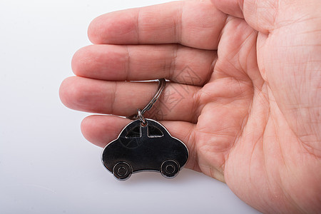 装有金属汽车图标的汽车商业概念保养奢华保险玩具驾驶交通旅行引擎车辆服务图片