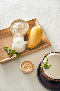 与科诺努特 芒果 大米 芝麻甜点白色热带食物托盘健康椰子牛奶黄色水果图片