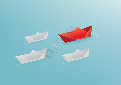 折纸红纸船漂浮在白纸船前 领导理念图片
