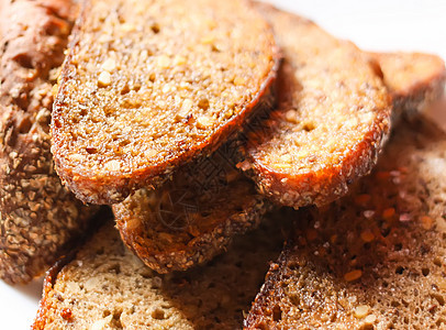 配烤面包板面包碳水脆皮黄色营养饼干棕色美食宏观小吃图片