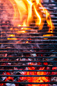 清空热炭烧烤烧烤炉 盛着明亮的火焰煤炭烹饪网格餐厅空烤架壁炉营火木炭炙烤火烧烤图片