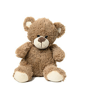 坐在白色孤立背景的白棕褐色可爱泰迪熊图片