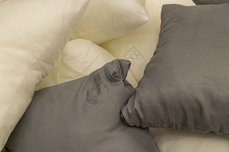 睡觉的枕头特写作为背景装饰柔软度羽毛睡眠房子寝具织物工厂酒店纺织品图片