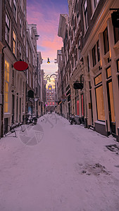 荷兰阿姆斯特丹寒冬雪红利格特区日落日落图片