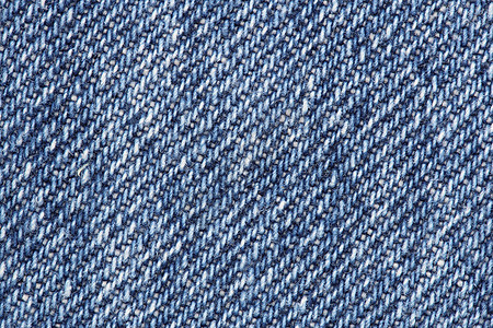 特写蓝色牛仔裤纹理青色纺织品帆布裤子面料编织接缝织物材料宏观图片