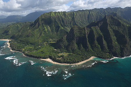 Kauai海岸景观悬崖直升机海滩海洋热带风景假期天线旅行绿色图片