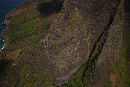 Kauai海岸景观热带海滩假期海岸线风景旅行崎岖绿色直升机悬崖图片