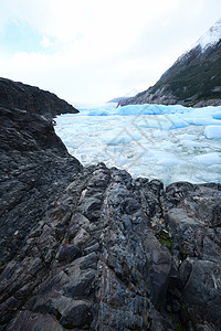 智利巴塔哥尼亚冰川灰色的蓝冰冰山蓝色场地旅游天空山脉旅行国家痛苦公园图片