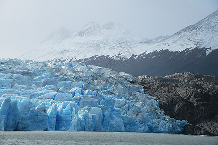 智利巴塔哥尼亚冰川灰色的蓝冰场地山脉公园旅游国家旅行蓝色天空冰山痛苦图片