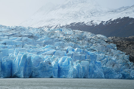 智利巴塔哥尼亚冰川灰色的蓝冰公园冰山旅游蓝色天空痛苦山脉国家旅行场地图片