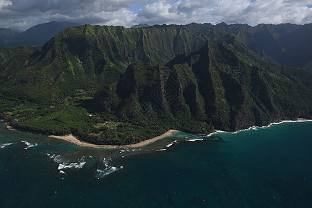 Kauai海岸景观绿色假期旅游风景海滩天线天堂崎岖旅行直升机图片