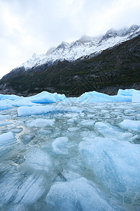 智利巴塔哥尼亚冰川灰色的蓝冰山脉蓝色天空公园国家痛苦旅游旅行冰山场地图片