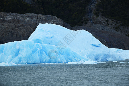 智利巴塔哥尼亚冰川灰色的蓝冰场地天空山脉冰山痛苦旅行蓝色国家旅游公园图片