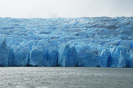 智利巴塔哥尼亚冰川灰色的蓝冰天空蓝色旅游国家公园旅行场地山脉痛苦冰山图片
