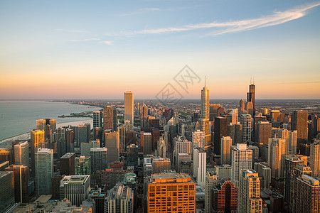 日落时芝加哥市中心天线的空中景象市中心城市天文蓝色酒店街道景观办公室摩天大楼建筑图片