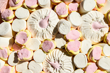 多彩多姿的棉花糖背景 棉花糖的形状和大小五颜六色和不同的背景图片