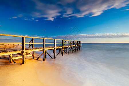 路亚钓鱼澳洲索雷托市日出时的国王海滩旅游天空钓鱼地平线太阳海岸线蓝色旅行码头海洋背景