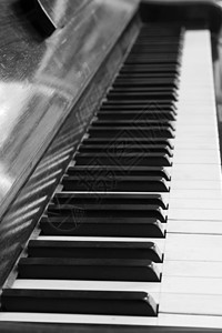钢琴键和木质谷物键盘音乐家白色古董乌木钥匙木头音乐会棕色乐器图片