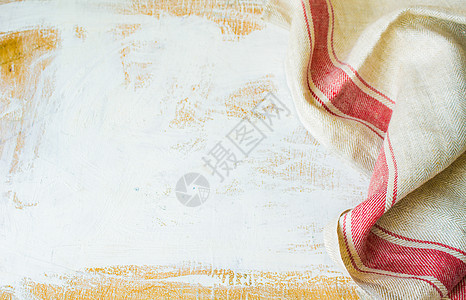 厨房毛巾或餐巾纸桌子餐巾蓝色检查木头材料纺织品棉布野餐乡村背景图片